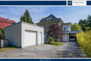 Großzügiges Zweifamilienhaus mit Charme und modernem Gartenambiente