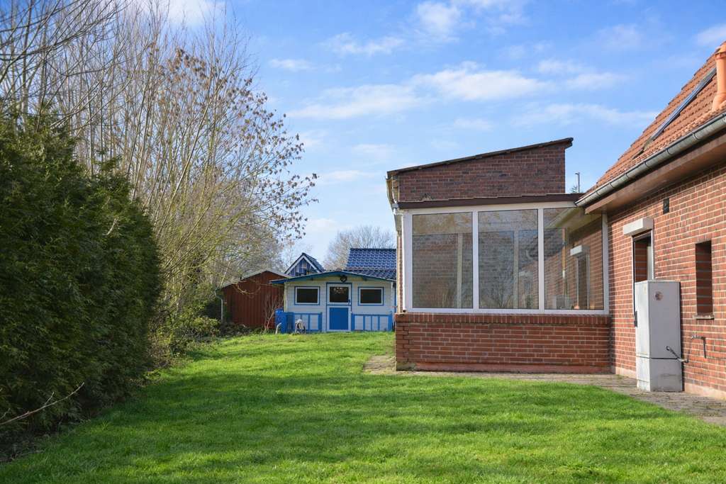 Immobilie in Neuenkirchen - Ein Zuhause in idyllischer Lage mit direktem Medemzugang und viel Potential - Bild 1