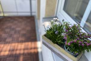 Geschmackvolle Wohnung mit Balkon und hochwertiger Einbauküche 