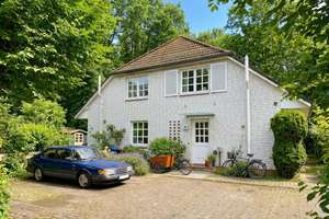 Familienglück mit direktem Zugang zum Naturschutzgebiet – Gepflegte Doppelhaushälfte mit Süd-West...