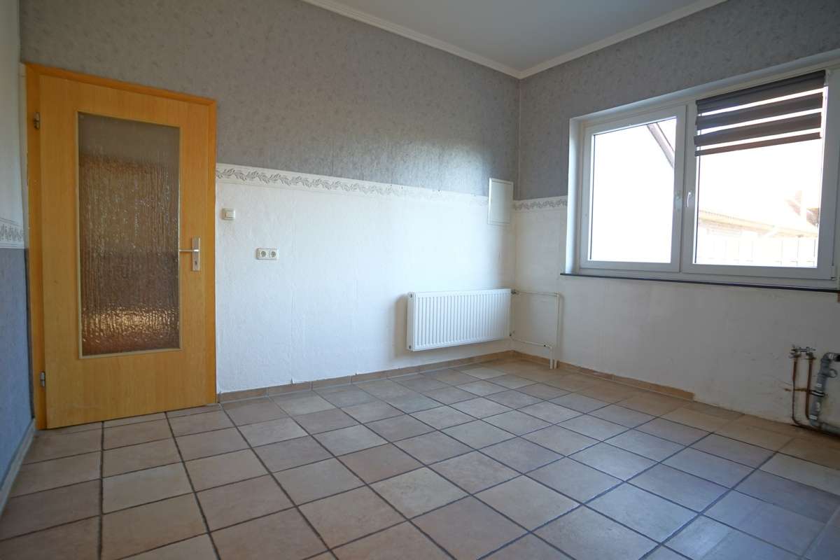 Immobilie in Schiffdorf - Volksbank Immobilien:
Einfamilienhaus mit Einliegerwohnung auf herrlichem Grundstück - Bild 18