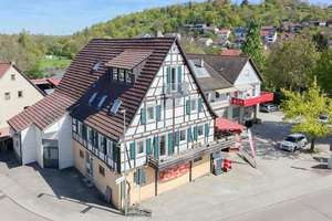 Wohnen & Arbeiten unter einem Dach – Haus mit Laden, Lager & Entwicklungspotenzial in zentraler Lage