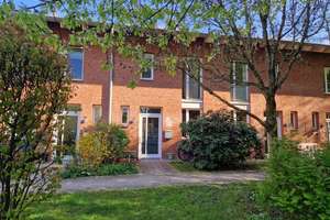 Familienfreundliches Reihenhaus mit Gartenanteil und Stellplatz - rechtlich Eigentumswohnung (WEG)