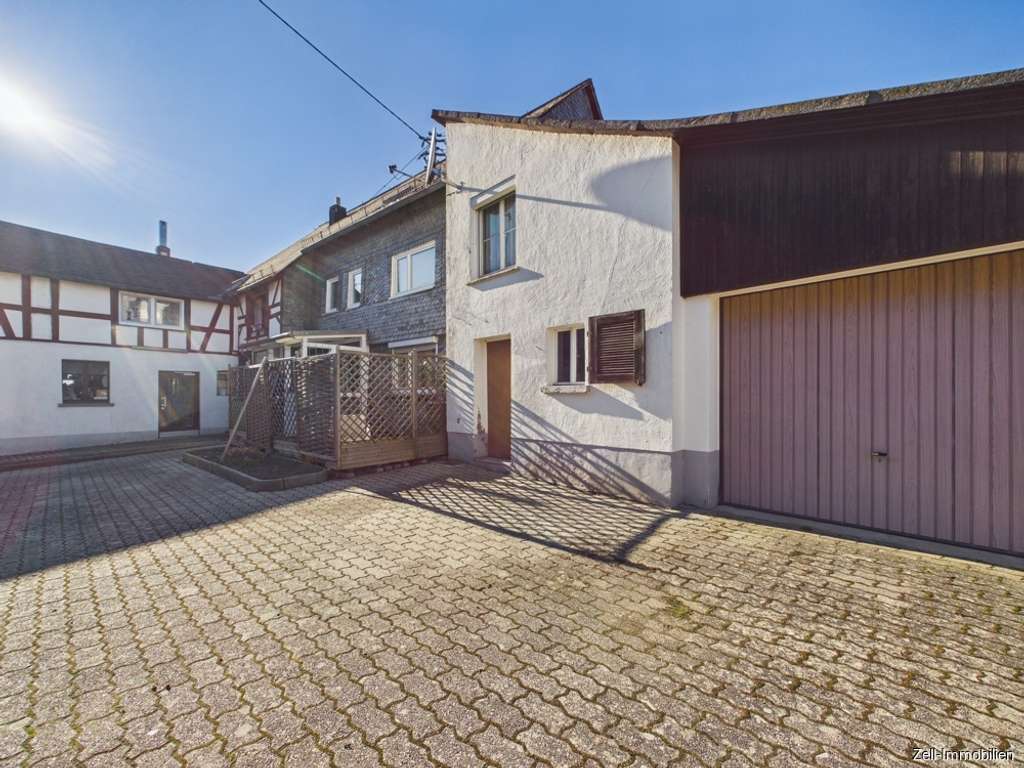 Immobilie in Weisel - Charmantes Einfamilienhaus mit Nebengebäude, Garage und Scheune in Weisel zu verkaufen - Bild 4