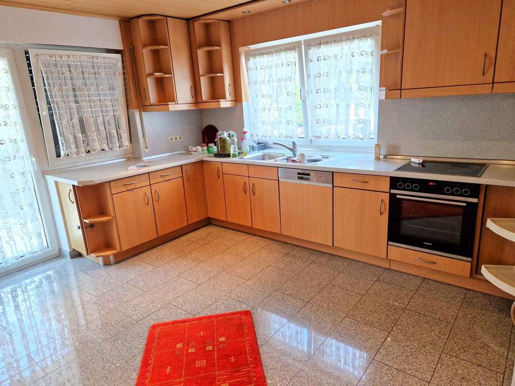 Immobilie in Graben-Neudorf - Familienfreundliche 4-Zimmer-Wohnung mit Garten, Terrasse und Garage - Bild 4