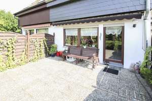 Familienglück in Berlin-Buckow – Großzügiges Reihenmittelhaus mit Terrasse, Garten und Stellplatz – Die vollständige Adresse der Immobilie erhältst du vom Anbieter., 12351 Buckow, Berlin – Vorschaubild 1