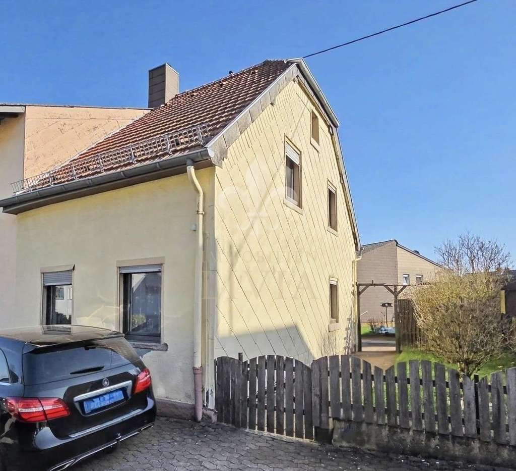 Immobilie in Spiesen-Elversberg - Gemütliches Einfamilienhaus mit großem Garten - Bild 1