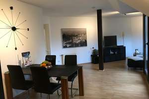 Lichtdurchflutete 2-Zimmer-DG-Wohnung mit Sonnenbalkon am Rhein