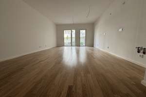 Erstbezug!: 4-Zimmer-Wohnung im Erdgeschoss mit Balkon