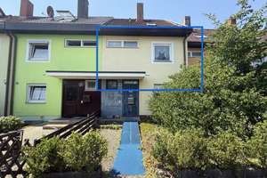 Familienglück mit Garten: Reihenmittelhaus mit viel Potenzial in 90453 Nürnberg-Katzwang 