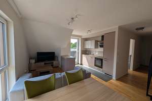 Moderne Dachgeschosswohnung mit Balkon