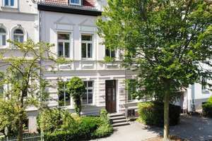 Einzigartiges Wohngefühl im Kreuzviertel: 
Stilvolle Split-Level-Wohnung mit Westbalkon