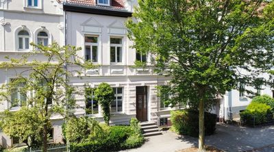 Einzigartiges Wohngefühl im Kreuzviertel:
Stilvolle Split-Level-Wohnung mit Westbalkon