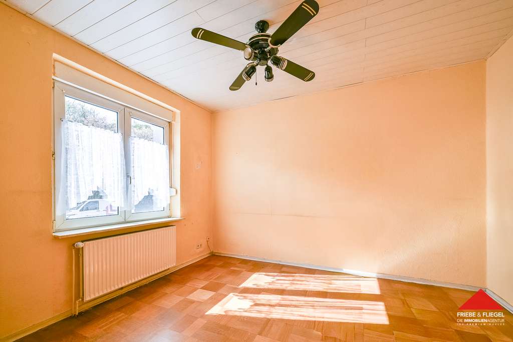 Immobilie in Dortmund - Einfamilienhaus mit Anbau und zwei Kfz-Stellplätzen in ruhiger Sackgassenlage - Bild 2