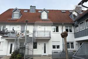 Wohnen auf drei Ebenen – stilvolle Maisonette mit Balkon.