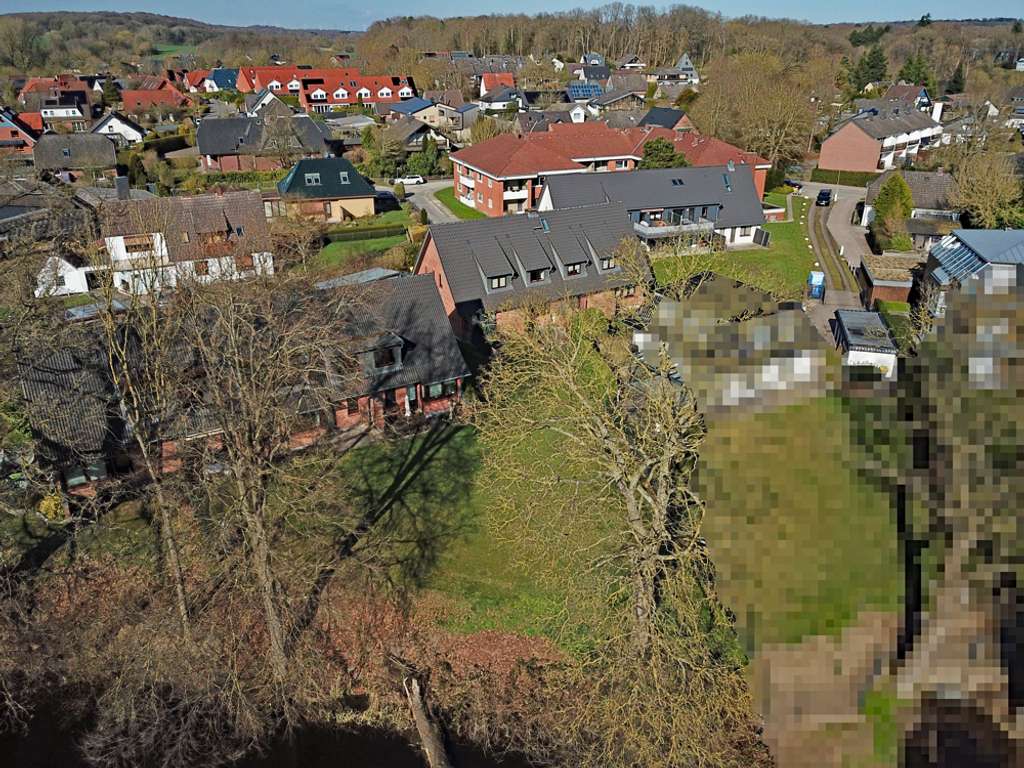 Immobilie in Reinfeld - Reinfeld - Traumlage direkt am schwarzen Teich - gepflegtes Ensemble aus 4 Eigentumswohnungen (vollv - Bild 2
