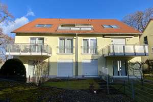 Gemütliche, helle Dachgeschosswohnung inkl. TG in Bestlage!