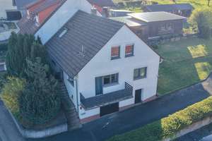 Grünes Wohnglück in Bischbrunn – EFH mit Einliegerwohnung und Garten – Die vollständige Adresse der Immobilie erhältst du vom Anbieter., 97836 Bischbrunn – Vorschaubild 1