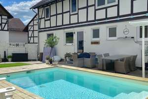 Von Historie zur Moderne: Einfamilienhaus mit Pool in begehrter Lage von Baunatal – Die vollständige Adresse der Immobilie erhältst du vom Anbieter., 34225 Baunatal – Vorschaubild 5