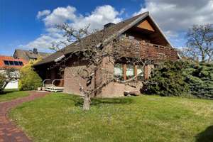 Architektenhaus mit großzügiger ebenerdiger Wohnung und zusätzlicher Einliegerwohnung – Die vollständige Adresse der Immobilie erhältst du vom Anbieter., 30890 Barsinghausen – Vorschaubild 1