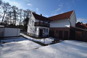 Freistehendes Einfamilienhaus mit kleinem Nebengelass, Garage und ebenerdigen Grundstück – Die vollständige Adresse der Immobilie erhältst du vom Anbieter., 37445 Walkenried – Vorschaubild 1