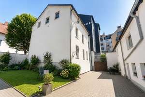 Wohnensemble mit Potenzial: Mehrfamilienhaus & Einfamilienhaus mit Garten und Innenhof