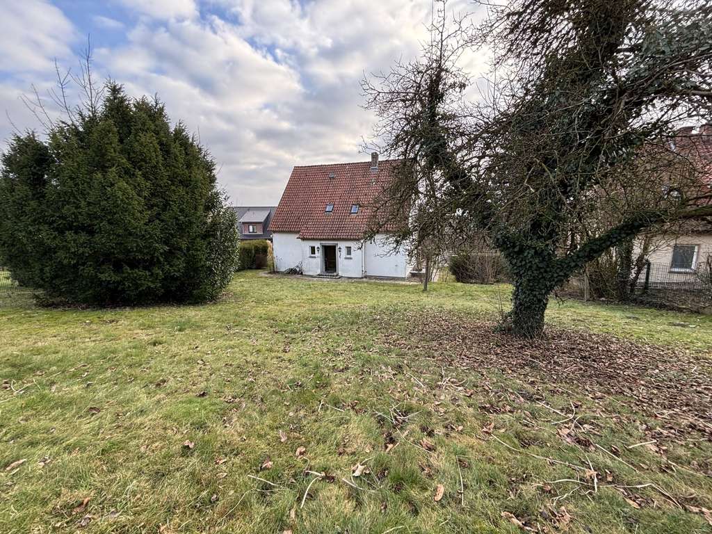 Immobilie in Ostercappeln - Einfamilienhaus mit großem Grundstück, 2 Garagen und viel Potenzial - Bild 4