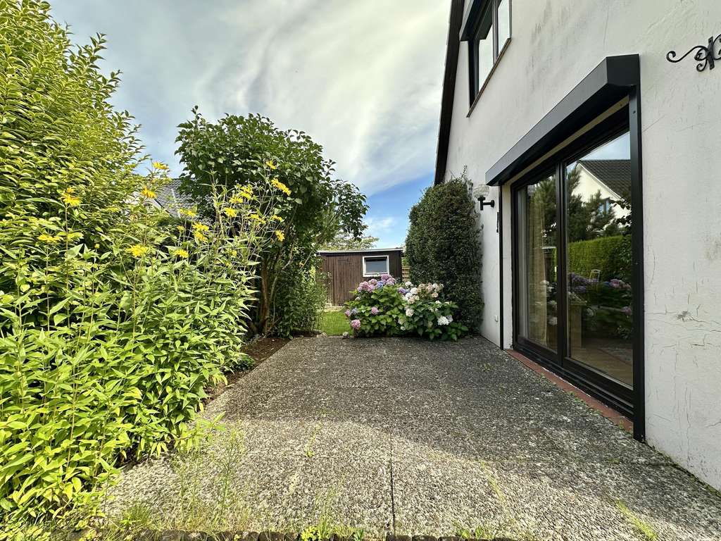 Immobilie in Norderstedt - Charmantes Einfamilienhaus mit Einliegerbereich in ruhiger Lage von Norderstedt - Bild 2