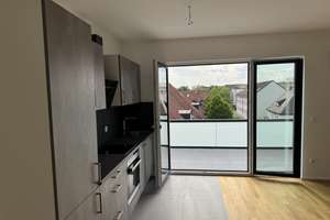 Erstbezug | exklusive 2,5-Zimmer Wohnung | Einbauküche | Balkon | Einzelgarage | ER-Zentrum