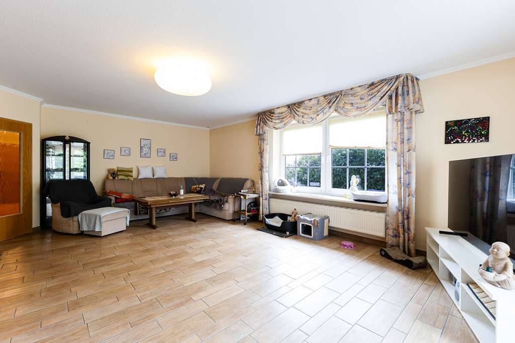 Immobilie in Ostrohe - Wohnen auf einer Ebene – charmanter Bungalow mit Garten und Garage in Ostrohe - Bild 1