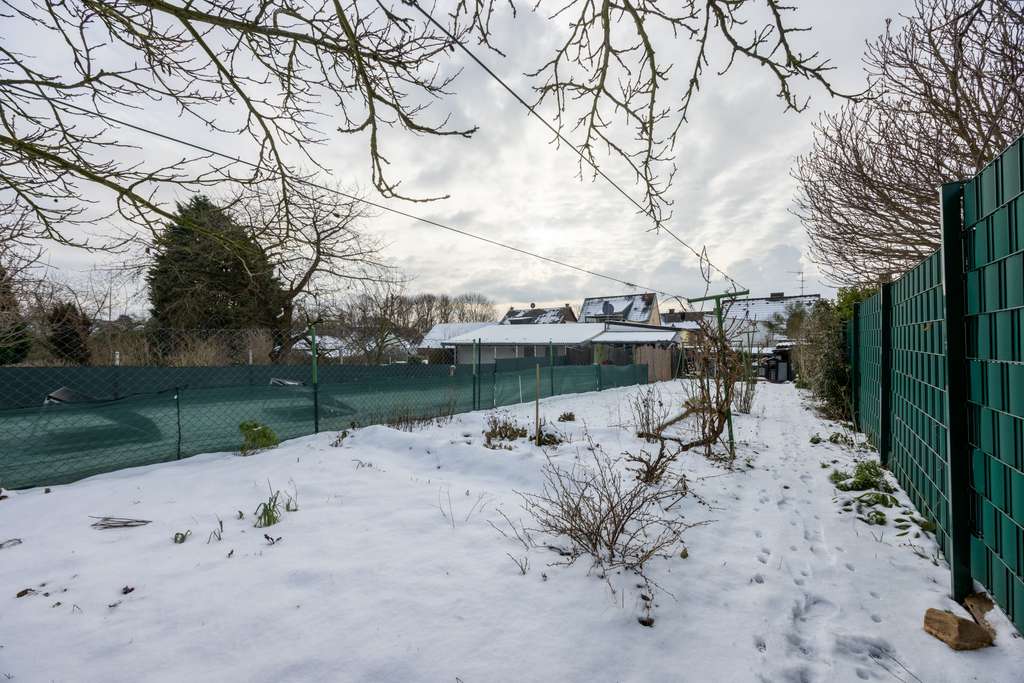 Immobilie in Rommerskirchen - Sanierungsbedürftiges Einfamilienhaus mit Anbau & Garten auf schönem Grundstück - Bild 0