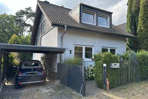 Wohnen im Grünen: Modernes Einfamilienhaus mit großem Garten, Carport und Split-Level-Architektur – Die vollständige Adresse der Immobilie erhältst du vom Anbieter., 51503 Rösrath – Vorschaubild 2