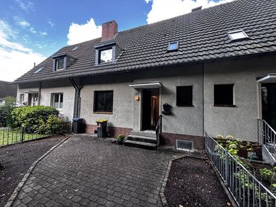 Reihenmittelhaus mit Garten und Garage in Köln-Höhenhaus – viel Potenzial für Ihre Wohnideen.
