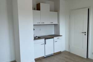 Charmante 1-Zimmer Dachgeschosswohnung mit Balkon in München Untermenzing