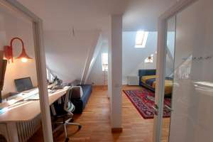 Seltene Studio-Dachgeschosswohnung mit Dachterrasse