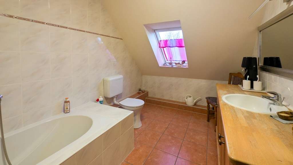 Immobilie in Steinfeld - Attraktives Zweifamilienhaus in Holzbauweise in ruhiger, ländlicher Lage - Bild 4