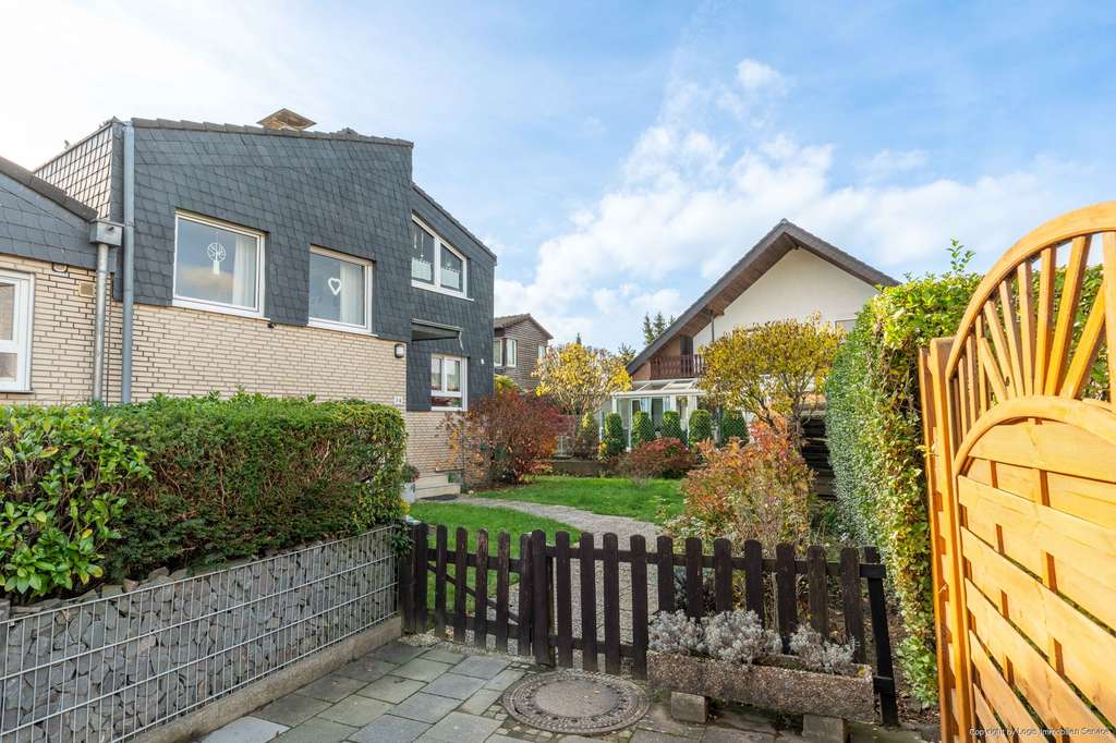 Platz für Familie & Ideen – top gepflegtes Split-Level-Endhaus mit Wintergarten in Mülldorf