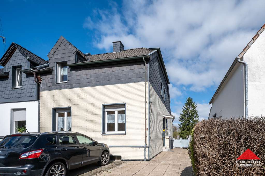 Immobilie in Dortmund - Einfamilienhaus mit Anbau und zwei Kfz-Stellplätzen in ruhiger Sackgassenlage - Bild 0