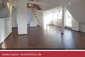 Grosszügige DG-Studio-Wohnung mit Südbalkon
