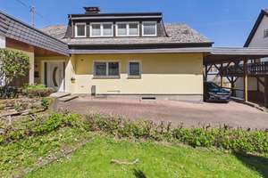  Freistehendes Einfamilienhaus mit Einliegerwohnung - Zum Verlieben