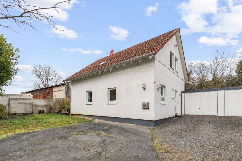 Immobilie in Biebelnheim - Energieeffizientes Zuhause mit großzügiger Terrasse und Doppelgarage! - Bild 1