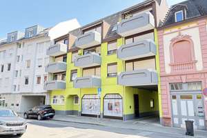 Attraktive, sanierte 2 - Zimmer Wohnung mit TG Stellplatz in zentraler Lage