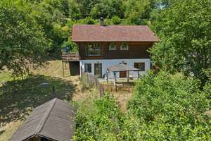 Modautal-Webern: Idyllisches Blockhaus mit Einliegeroption auf großem Grundstück