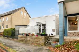 Gepflegte 4-Zimmer-Wohnung mit Terrasse & Garage – modernisiert, mit besonderem Charakter