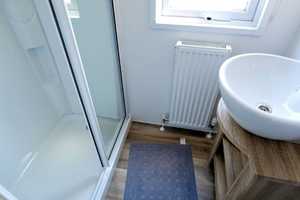 *Ihr Ferienhaus an der Nordsee* Neues Chalet auf schönem Grundstück am Deich des Jadebusens – Brachvogelweg 1, 26349 Wesermarsch (Kreis) – Vorschaubild 11