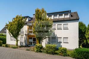 Modernes Wohnen auf ca. 56 m² – offene Küche, neues Bad und Balkon.