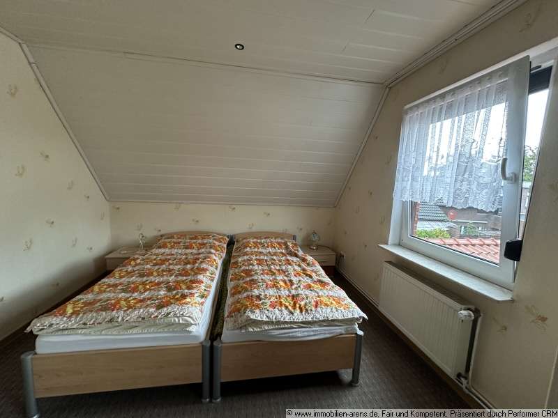 Immobilie in Apen - solides Klinkergebäude mit Garage und Wintergarten in Apen - Bild 10