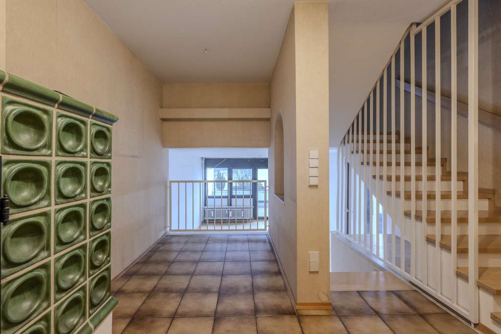 Immobilie in Gauting - Urlaubsflair pur: Sonnige 3-Zimmer-Maisonettewohnung mit Süddachterrassen in Gauting - Bild 1