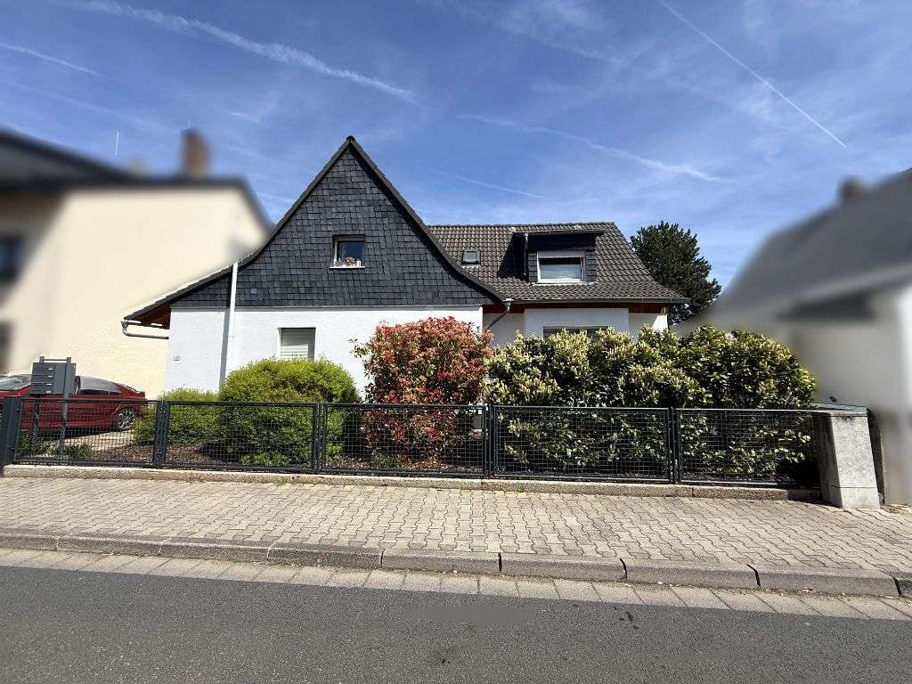 Immobilie in Kelsterbach - Vermietetes Mehrfamilienhaus mit Nebengebäude  Garten in zentraler Lage von Kelsterbach - Bild 3