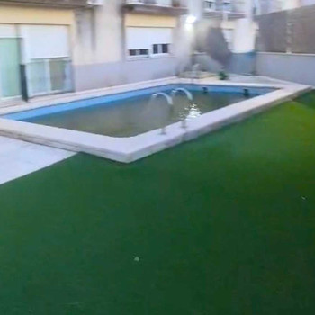 REIHENHAUS-DUPLEX MIT POOL UND GARAGE
